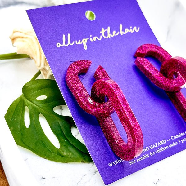 All Up In The Hair | Online Accessory Boutique Located in Mooresville, NC | Side view of two Pink Chunky Chain Earrings on an indigo backer card.