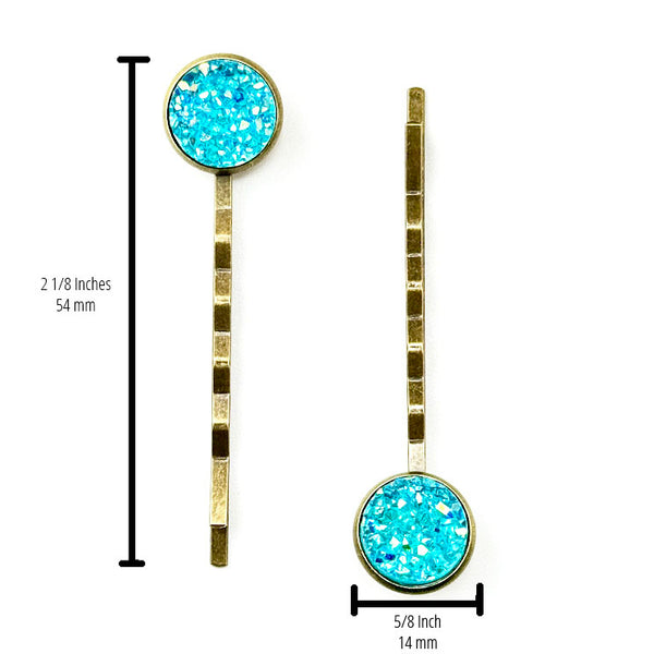 All Up In The Hair | Online Accessory Boutique Located in Mooresville, NC | Two Aquamarine Druzy Bobby Pins on a plain white background. Bobby pin measurements are written to the left of the left bobby pin and under the right bobby pin.