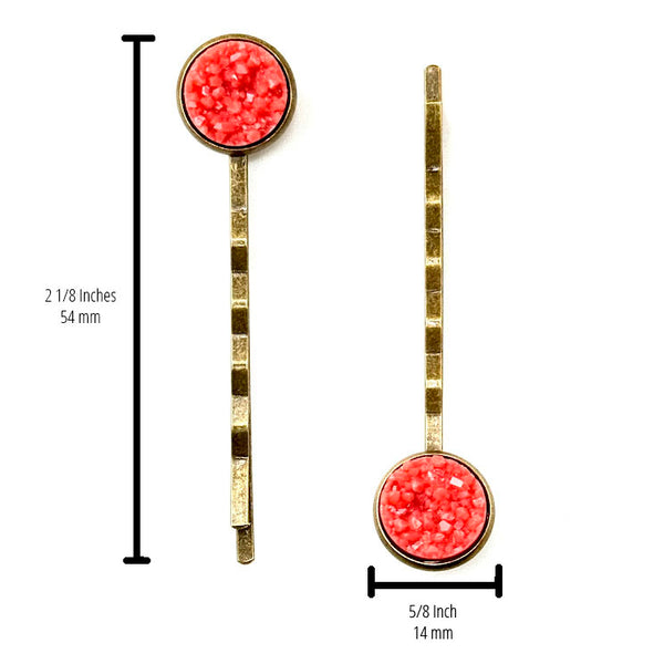 All Up In The Hair | Online Accessory Boutique Located in Mooresville, NC | Two Coral Druzy Bobby Pins on a plain white background. Measurements for the bobby pins are written to the left of the left bobby pin and under the right bobby pin.