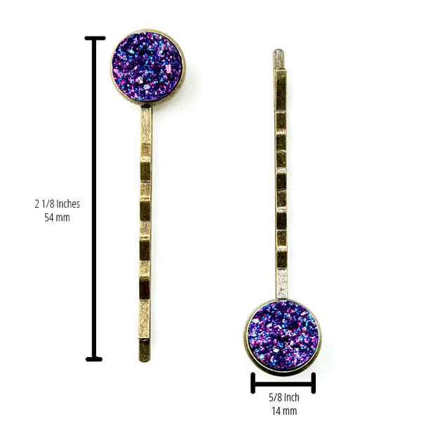 All Up In The Hair | Online Accessory Boutique Located in Mooresville, NC | Two Indigo Druzy Bobby Pins on an all white background. Measurements for the bobby pins are written to the left of the left bobby pin and under the right bobby pin.