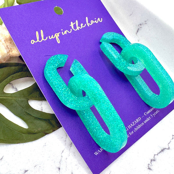 All Up In The Hair | Online Accessory Boutique Located in Mooresville, NC | Side view of two Mint Chain Earrings on an indigo backer card.