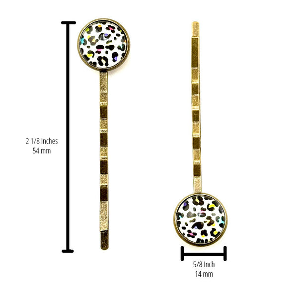 All Up In The Hair | Online Accessory Boutique Located in Mooresville, NC | Two Rainbow Leopard Bobby Pins on a white background. The bobby pin measurements are written next to the left bobby pin and under the right bobby pin.