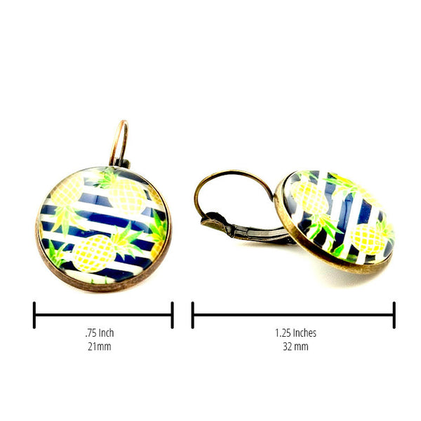 All Up In The Hair | Online Accessory Boutique Located in Mooresville, NC | Two Stripe Pineapple Earrings on a white background. On is turned sideways. The measurements of the earrings are written under each earring.