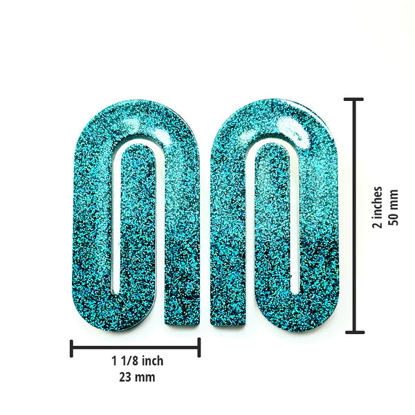 All Up In The Hair | Online Accessory Boutique Located in Mooresville, NC | Two teal paperclip earrings on a plain white background. There are measurements under the left earring and to the right of the right earring.