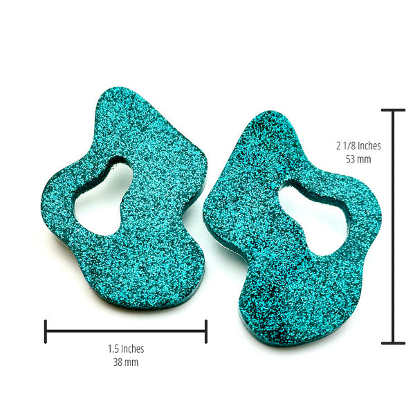 All Up In The Hair | Online Accessory Boutique Located in Mooresville, NC | Two Teal Wave Earrings on a white background. The measurements of the earrings are written under the left earring and next to the right earring.